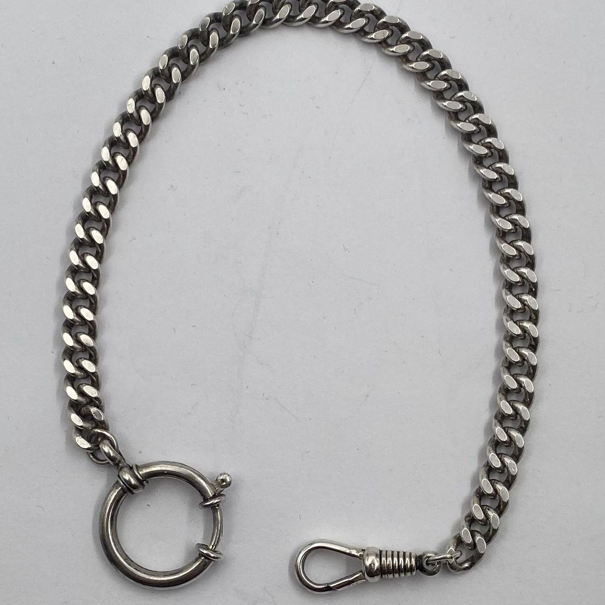 Klokkelenke i 835 sølv.